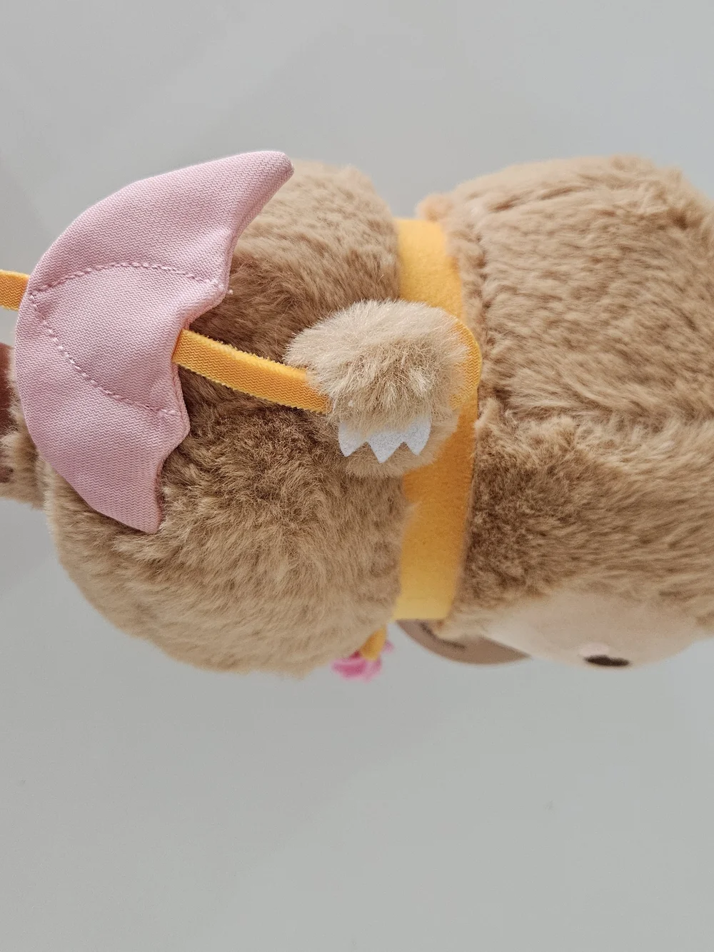 Plush Brown Monster Stuffed Animal with Pink & Yellow Accents